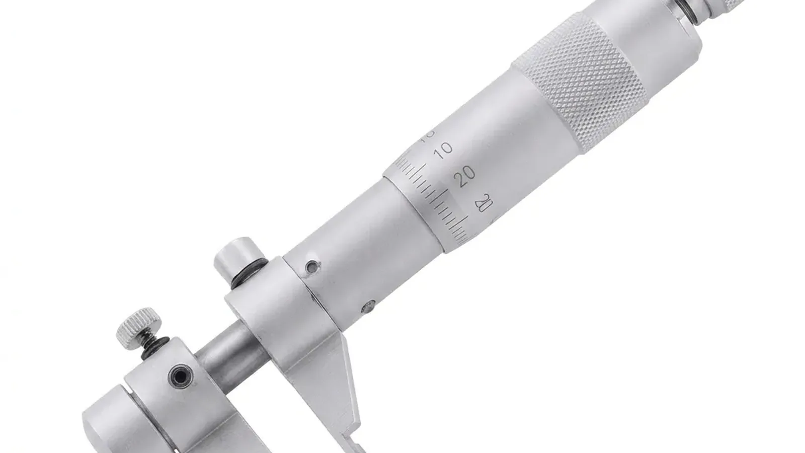 Close-up of a metal internal micrometer with measurement scale and adjustment screws